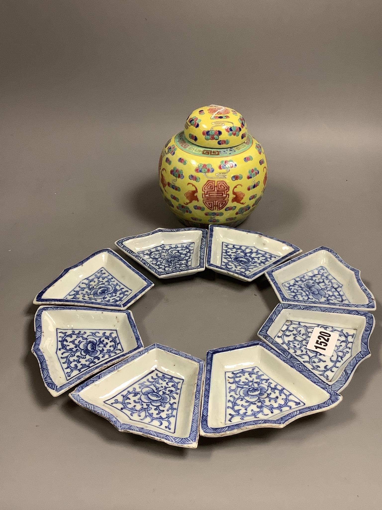 A set of Chinese blue and white supper dishes, late Qing and a Chinese yellow ground jar cover, early 20th century